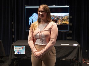 Fourth-year University of Regina computer science student Kadence Meredith shows off her capstone projects at an announcement of new and expanded Creative Technologies & Design programs for 2024 on Friday, Feb. 9, 2024 in Regina.