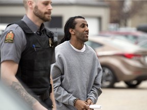 This 2019 file photo shows Awet Mehari arriving in custody to what was then called Regina's Court of Queen's Bench, where a sentencing hearing was taking place following his being convicted of sexual assault.