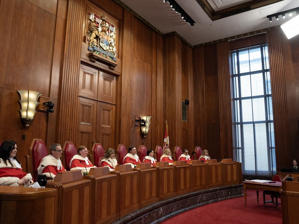 The Supreme Court of Canada will review the case of a man who was arrested for drug and firearm offences after police encountered him at the scene of an overdose. Supreme Court of Canada Justice Michelle O'Bonsawin left to right, Justice Nicholas Kasirer, Justice Malcolm Rowe, Justice Andromache Karakatsanis, Chief Justice Richard Wagner, Justice Suzanne Cote, Justice Sheilah Martin, Justice Mahmud Jamal and Justice Mary Moreau are seen during a welcome ceremony at the Supreme Court, in Ottawa, Monday, Feb. 19, 2024.
