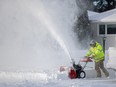 Residents were digging out in Saskatoon after at least 25 centimetres of snow fell on the city. Photo taken in Saskatoon, Sask. on Monday, March 4, 2024.