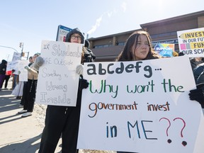 Students from high schools across Saskatoon walk out of afternoon classes and protest outside of Don Morgan's office in a show of support for the province's teachers. The Saskatchewan Teachers' Federation and the provincial government remain at a standstill on a new collective agreement Photo taken in Saskatoon, Sask. on Tuesday, March 26, 2024.