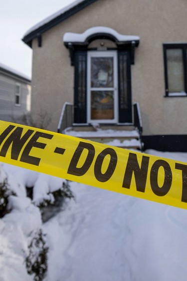 A police vehicle sits out front a home on the 1600 block of Toronto Street as the police conduct a death investigation on Wednesday, January 5, 2022 in Regina.