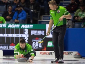 Team Saskatchewan skip Mike McEwen delivers a rock during playoff game action at the 2024 Montana's Brier inside the Brandt Centre.