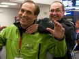 SASKATOON, SASK. MARCH 5, 2012--Eugene Hritzuk and Rick Folk share a laugh in the player's lounge at the Brier in Saskatoon March 5, 2012.
