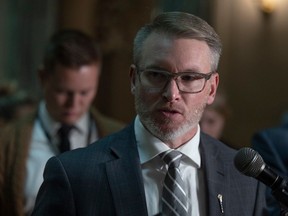 Minister of Health Everett Hindley answers questions from the press after Question Period at the Saskatchewan Legislative Building on Thursday, October 12, 2023 in Regina.