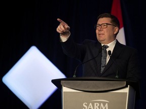 Premier Scott Moe addresses attendees at the Saskatchewan Association of Rural Municipalities' (SARM) annual convention at the Queensbury Centre on Thursday, March 14, 2024 in Regina.