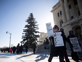 Striking teachers and their supporters march around the Saskatchewan Legislative Building on Monday, March 4, 2024 in Regina. This action coincides with the first day of the spring legislative session.
