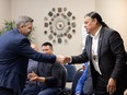 Immigration and Career Training Minister Jeremy Harrison (left) and Saskatchewan First Nations Natural Resource Centre of Excellence president and CEO Sheldon Wuttunee shake hands during an announcement of a partnership to grow Indigenous participation in Saskatchewan's natural resource workforce Monday at English River Business complex. Photo taken in Saskatoon, Sask. on Monday, April 29, 2024.