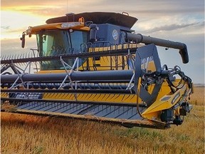 A combine in a field in Saskatchewan.
