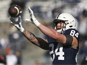Penn State tight end Theo Johnson (84) warms up for an NCAA college football game against Rutgers, Saturday, Nov.18, 2023, in State College, Pa.