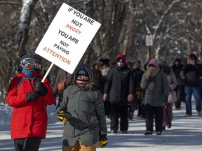 Striking teachers and their supporters march around the Saskatchewan Legislative Building on Monday, March 4, 2024 in Regina. This action coincides with the first day of the spring legislative session.