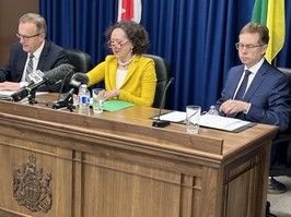 Minister of Energy and Resources Jim Reiter, left Minister of Justice Bronwyn Eyre and Economic Impact Assessment Tribunal Chair Michael Milani prepare to speak with media Monday April 8 in Saskatoon.