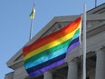 A pride flag flutters at the Legislative Building in Regina, Sask. on Sunday Feb. 9, 2014.