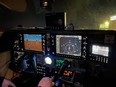 The navigation panel that faces Sgt. Steve Wyatt of the aerial support unit as he pilots the Regina Police Service's Cessna 182T on a patrol shift on March 18, 2024. Not pictured is the screen that relays the plane's camera feed, operated by a tactical officer in the rear of the cockpit.