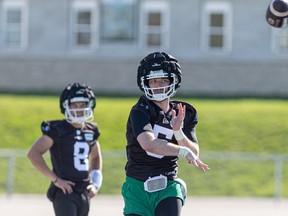 The Saskatchewan Roughriders chose quarterback Shea Patterson ahead of Mason Fine (8) during the CFL team's training camp.