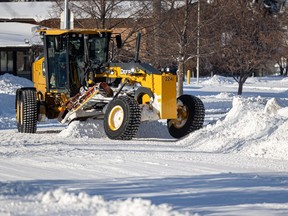 City crews were hard at work clearing streets, one day after a large snowfall in Saskatoon. Photo taken in Saskatoon, Sask. on Monday, Nov. 25, 2024.