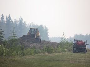 Saskatchewan Public Safety Agency contracted crews build a fire break off Highway 120 on Friday, May 30, 2025 in Candle Lake. KAYLE NEIS / Regina Leader-Post