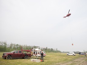 Helicopters contracted by the Saskatchewan Public Safety Agency run test flights at the Candle Lake Airpark on Saturday, May 31, 2025 in Candle Lake. KAYLE NEIS / Regina Leader-Post