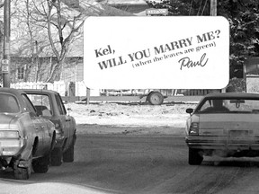 Marriage proposal billboard on Broadway Avenue