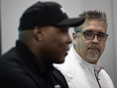 Saskatchewan Roughriders General Manager Jeremy O'Day watches defensive lineman Micah Johnson announce his retirement after 13 CFL seasons during a press conference inside Mosaic Stadium on Monday, January 5, 2026 in Regina.
