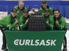 Team Knapp poses with the trophy after winning the 2026 SaskTel Tankard.
