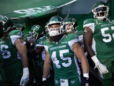 Saskatchewan Roughriders running back A.J. Ouellette (45) wait in the tunnel before the first half of CFL regular season action inside Mosaic Stadium on Friday, July 25, 2025 in Regina.