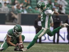 Saskatchewan Roughriders kicker Brett Lauther (12) kicks the ball during regular season CFL action inside Mosaic Stadium on Saturday, September 13, 2025 in Regina.