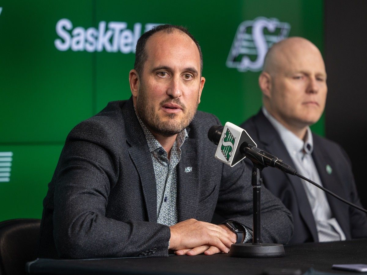 Saskatchewan Roughriders president and CEO Craig Reynolds, left, speaks during a media briefing ahead of the Annual General Meeting at Mosaic Stadium in Regina, on Tuesday, June 23, 2026.