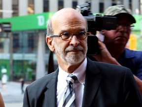 David Livingston, chief of staff to former Ontario premier Dalton McGuinty, arrives at court in Toronto on Friday, Sept. 22, 2017. Livingston and his deputy Laura Miller faced allegations they illegally destroyed documents related to a government decision to scrap two gas plants ahead of 2011 provincial election, but on Nov. 3, the prosecutor dropped breach of trust charges.