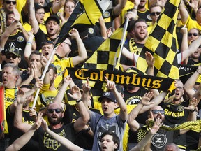 Columbus Crew fans cheer before a U.S. Open Cup soccer match against FC Cincinnati, in Cincinnati. The owner of the Crew SC says the team will move to Austin, Texas, unless a new stadium is built in Columbus. (AP)
