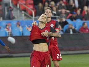 Toronto FC’s Sebastian Giovinco grimaces after missing a penalty against Montreal Impact last week. (STAN BEHAL/Toronto Sun)