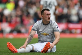 Manchester United's English defender Phil Jones  left Saturday's game with an injury.
 (GETTY IMAGES)