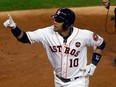 Yuli Gurriel #10 of the Houston Astros reacts after hitting a solo home run during the second inning against the Los Angeles Dodgers in game three of the 2017 World Series at Minute Maid Park on October 27, 2017 in Houston, Texas.  (Photo by Bob Levey/Getty Images)