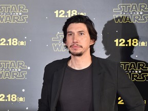 Actor Adam Driver poses during a promotional event for the upcoming Star Wars film in Tokyo on December 10, 2015.