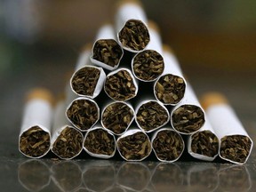 A picture taken on September 29, 2017 shows a close up shot a stack of cigarettes in Kuwait City.