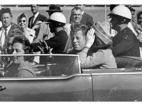 John F. Kennedy, Jacqueline Kennedy, John Connally, Nellie Connally

FILE - In this Nov. 22, 1963 file photo, President John F. Kennedy waves from his car in a motorcade in Dallas. Riding with Kennedy are First Lady Jacqueline Kennedy, right, Nellie Connally, second from left, and her husband, Texas Gov. John Connally, far left. The National Archives released the John F. Kennedy assassination files on Thursday, Oct. 26, 2017. (AP Photo/Jim Altgens, File)