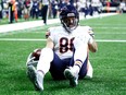 Zach Miller of the Chicago Bears holds his left knee after sustaining an injury on Oct. 29, 2017 (Getty)