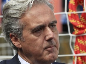 In this file photo dated Aug. 18, 2017, British International Trade Minister Mark Garnier, who has been caught up in the Westminster sexism storm, it is announced Sunday Oct. 29, 2017.  Britain's Cabinet Office will investigate allegations made against Garnier by his former secretary Caroline Edmondson, as published in newspaper reports Sunday, that he breached conduct rules by asking his secretary to buy sex toys. (Tim Goode/PA via AP)