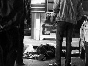 This file photo taken on September 27, 1985 shows the body of a man killed during an hold-up at the Delhaize supermarket in in Overijse, Flanders near Brussels, by the Mad Killers.