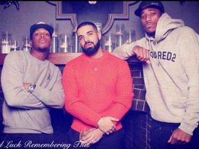 Drake, centre, with Raptors Kyle Lowry and DeMar DeRozan at his birthday bash.