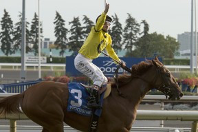 Eurico Da Silva guides Dixie Moon to victory. (Michael Burns/photo)