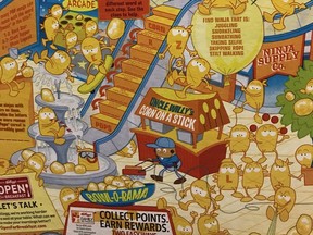 The illustration on a box of Kellogg's Corn Pops cereal shows corn pop characters at a mall with one brown corn pop as a janitor.