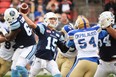 Toronto Argonauts quarterback Ricky Ray lets fly against the Winnipeg Blue Bombers during first half CFL football action in Toronto on Saturday, October 21, 2017. THE CANADIAN PRESS/Nathan Denette