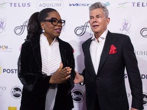 Oprah Winfrey and David Foster arrive for the David Foster Foundation 30th Anniversary Miracle Gala, in Vancouver, B.C., on Saturday October 21, 2017. (THE CANADIAN PRESS/Darryl Dyck)