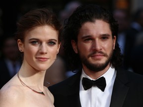 British actor Kit Harington (R) and British actress Rose Leslie (L) pose on the red carpet upon arrival to attend the 2016 Laurence Olivier Awards in London on April 3, 2016. (JUSTIN TALLIS/AFP/Getty Images)