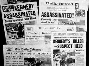 This Friday, Nov. 22, 1963 file photo shows the front pages of seven British national daily newspapers in London headlining the assassination of U.S. President John F. Kennedy.