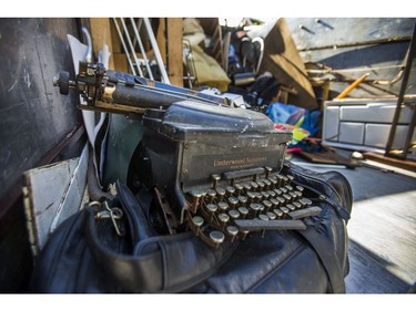 An old typewriter is sits on the back  of a JUSTJUNK truck, as a home is cleared of things no longer needed in Toronto, Ont. on Wednesday October 25, 2017.