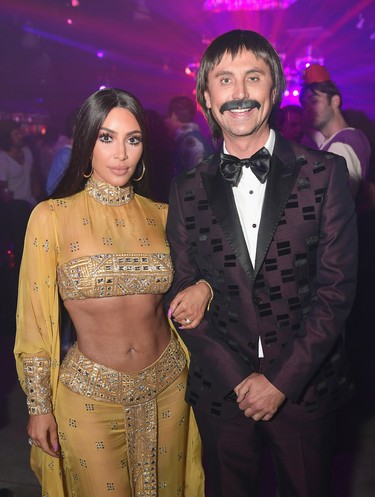 Kim Kardashian (L) and Jonathan Cheban dress as Cher and Sonny at the Casamigos Halloween Party on October 27, 2017 in Los Angeles, California.  (Photo by Neilson Barnard/Getty Images for Casamigos Tequila)