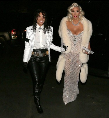 Kourtney Kardashian, left, and sister Kim dress up as Michael Jackson and Madonna. (kourtneykardash/Instagram)