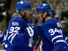 Josh Leivo and Auston Matthews celebrate a goal on Oct. 26, 2017 (Michael Peake/Postmedia Network)